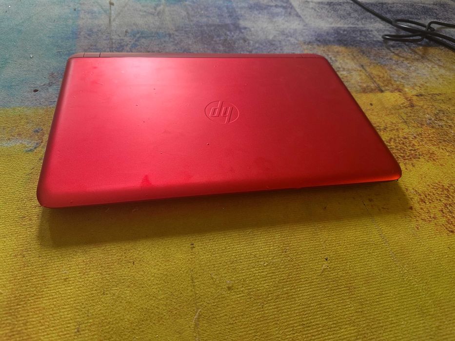 laptop Hp rosu, quadcore , video dediacat 1 gb , hdd 1tb