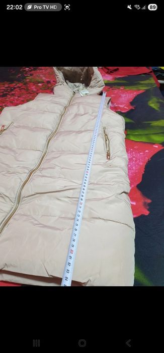 Vesta lunga cu gluga