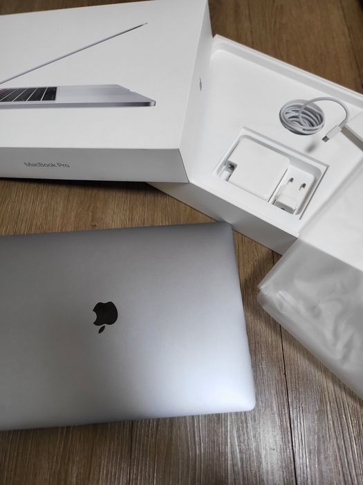 Macbook pro karobka hujati bilan