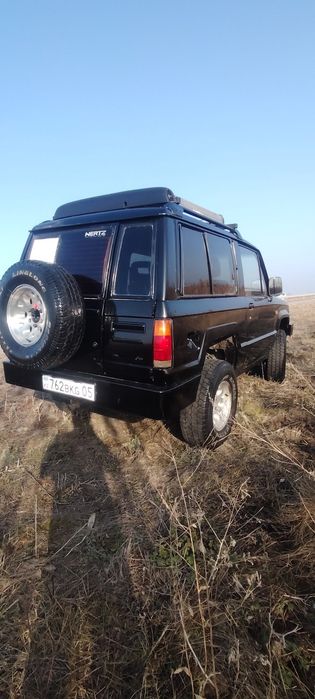 Автомобиль исузу труппер