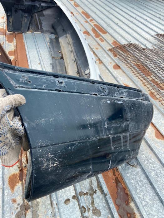 Задний бампер BMW e38 оригинал