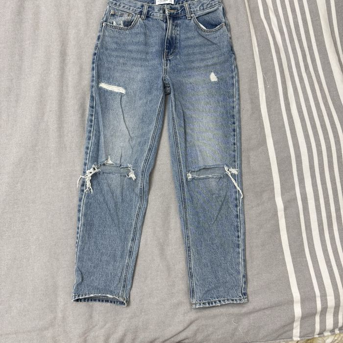 Женские джинсы  в отличном состояние