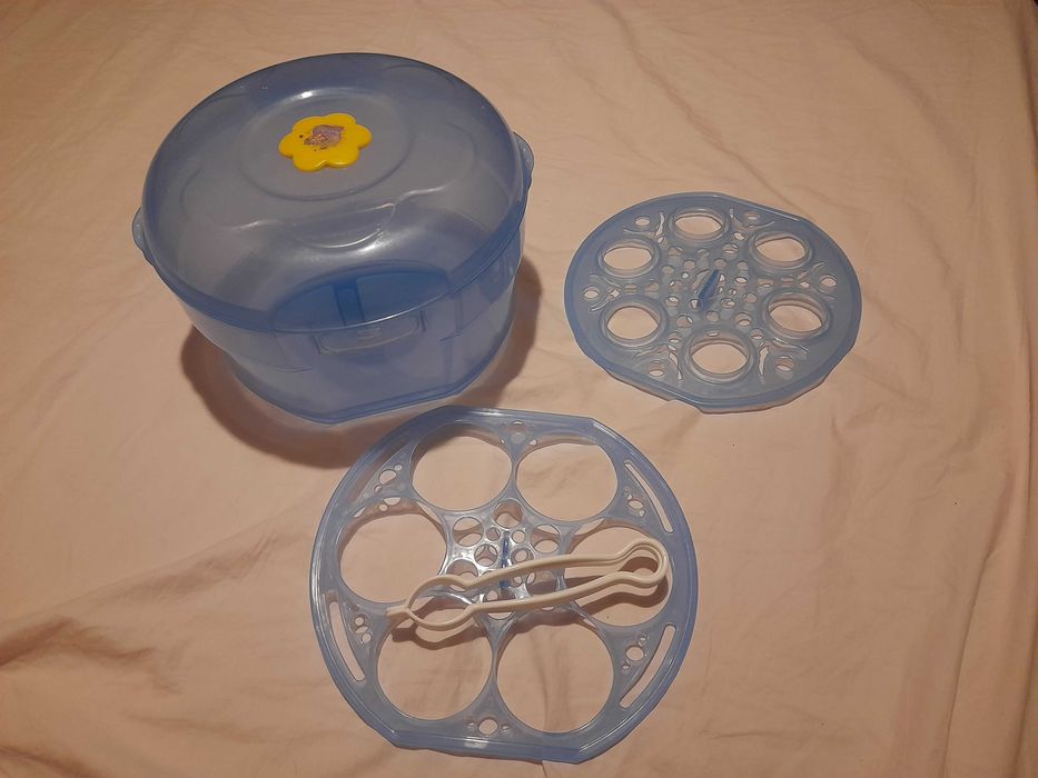 Двуфазна помпа за кърма Medela и подарък стерилизатор за микровълнова