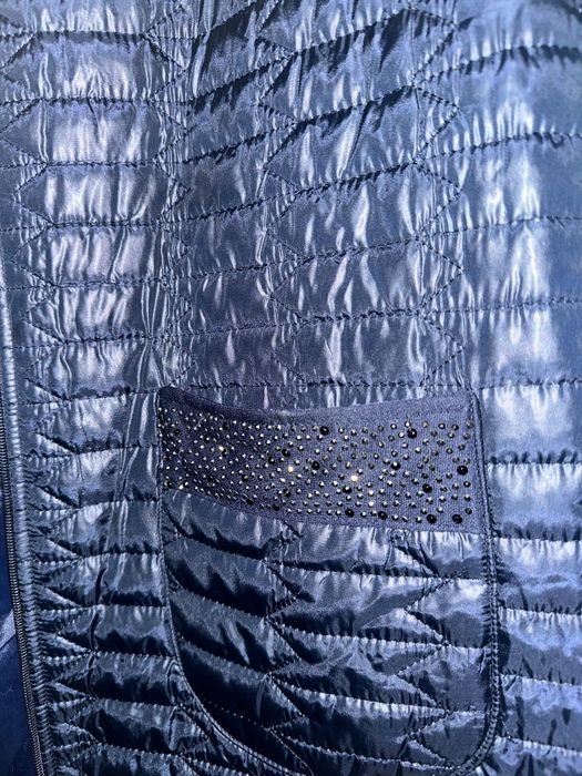 Продам желетку 56р