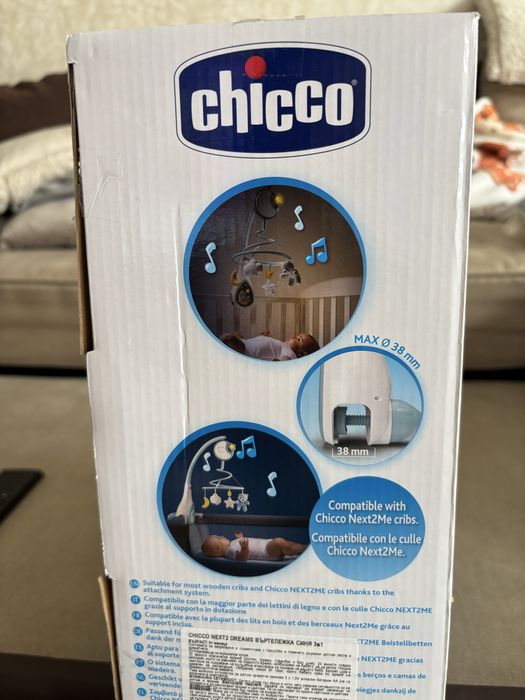 Нова Музикална въртележка за легло next to me Chicco