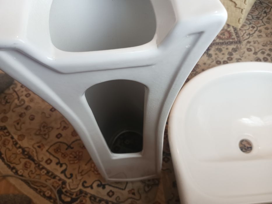 Раковина керамическая