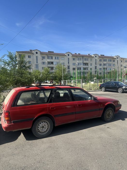 Мазда 626.