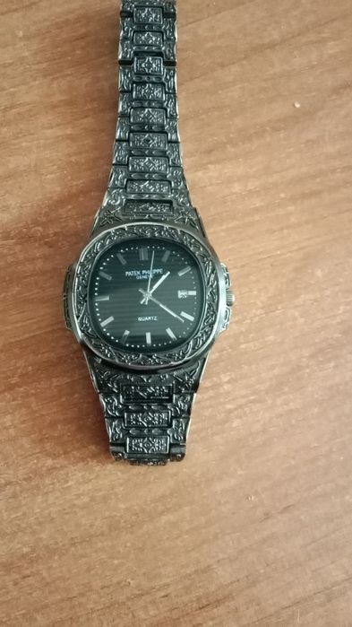Часы Patek Philippe.