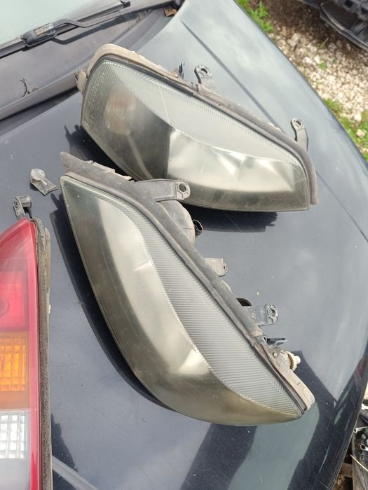 Faruri și triple Opel Astra G break 2003