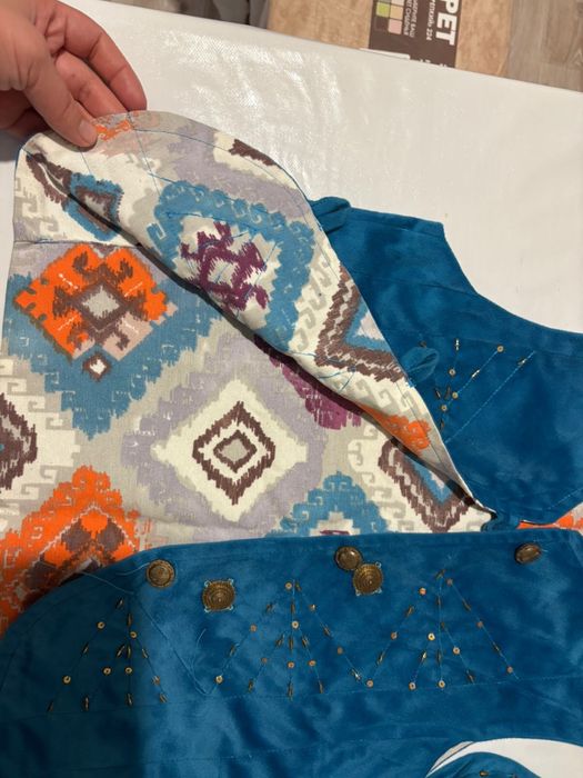 Детская жилетка