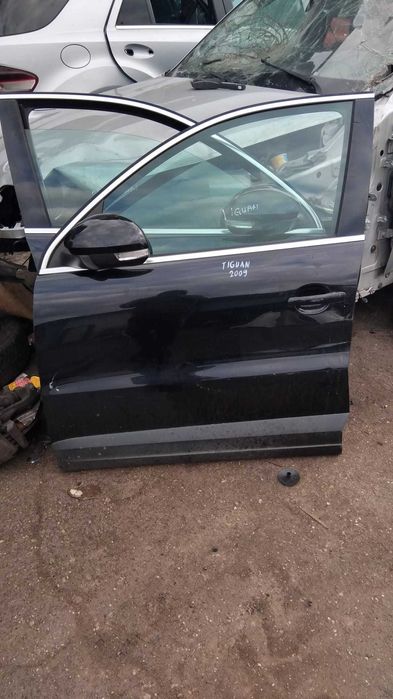Usa stanga/dreapta fata Volkswagen Tiguan an 2009