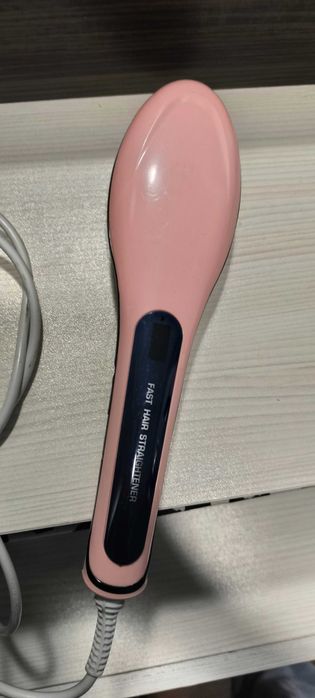 Електрическа четка за изправяне на коса