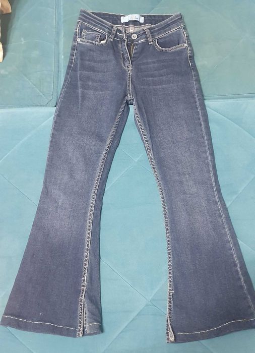 Джинсы на девочку.  8 9 лет