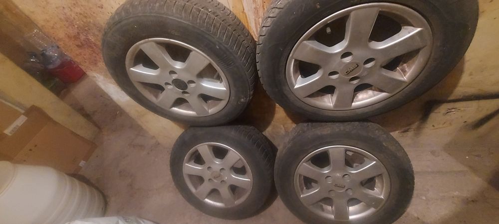 Алуминиеви джанти 14" с летни гуми 185/65/14 + още  2 гуми  подарък и вериги за сняг  и др. екстри