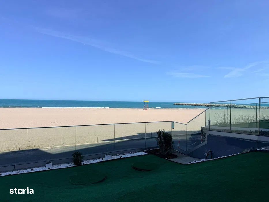 Apartament în bloc boutique, cu curte de 65 mp, pe malul marii –Olimp
