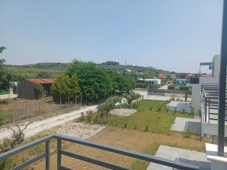 Продава нова лукс къща 72 м2 двор 557 м2 в Паралия Каряни, Гърция