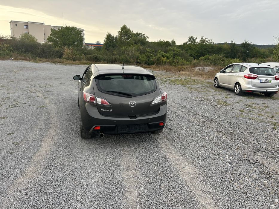 Mazda 3 1,6 benzina 105 cp 2010