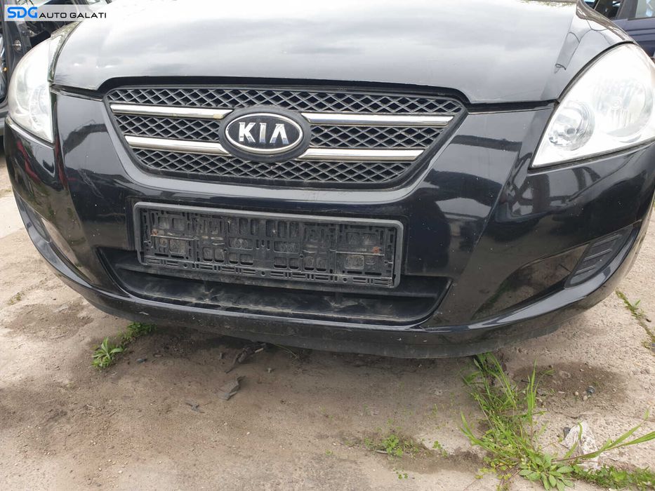 Bara Spoiler Fata Completa cu Grile Fara Grila cu Emblema cu Imperfectiuni Kia Ceed 2007 - 2010 Culoare 1K Black Pearl [Z0087]