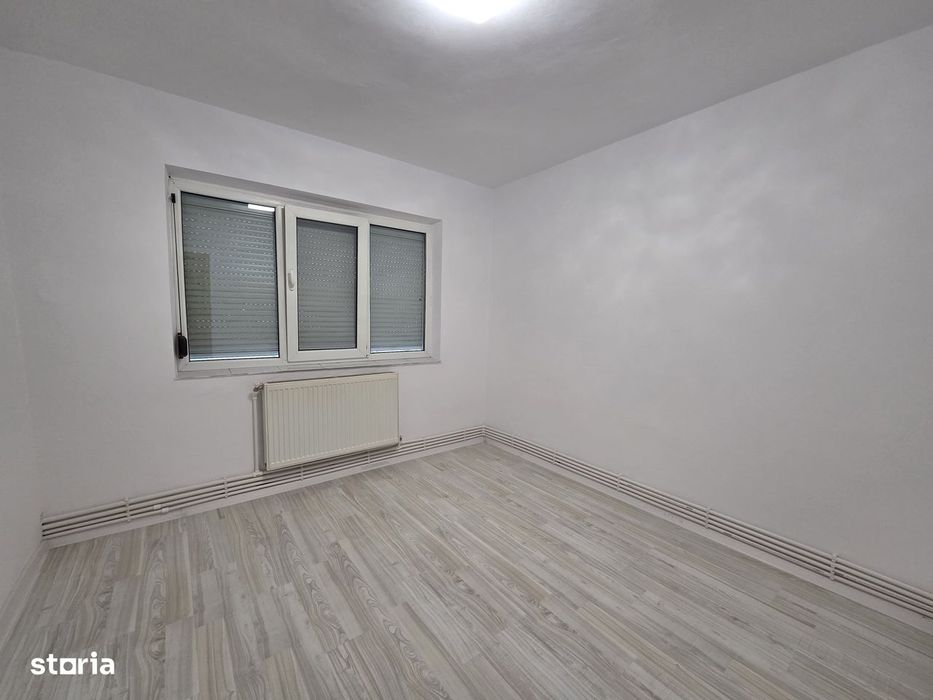 Apartament 2 camere imbunatatit parter zona Scoala Generala 2 - Adjud