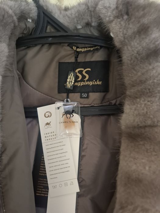 Зимний женский пуховик