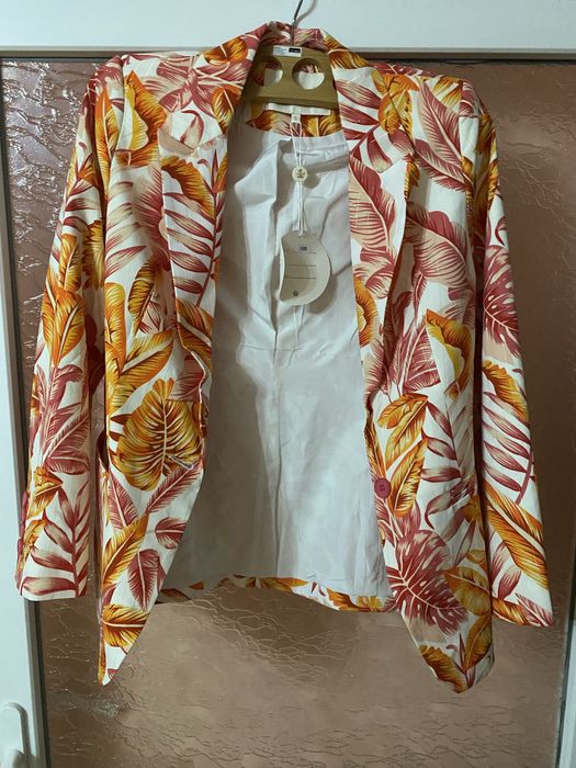 Sacou nou, cu eticheta