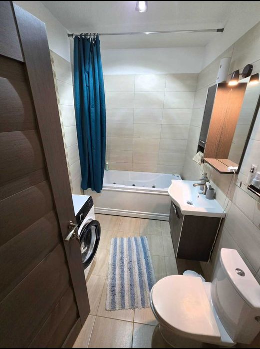 Apartament 2 camere + curte privată 50 mp + loc de parcare proprietate