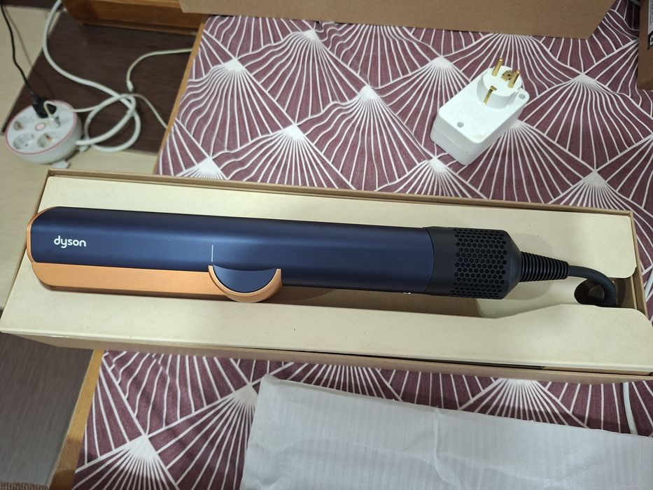 Placa Dyson pt indreptat si uscat parul in acelasi timp