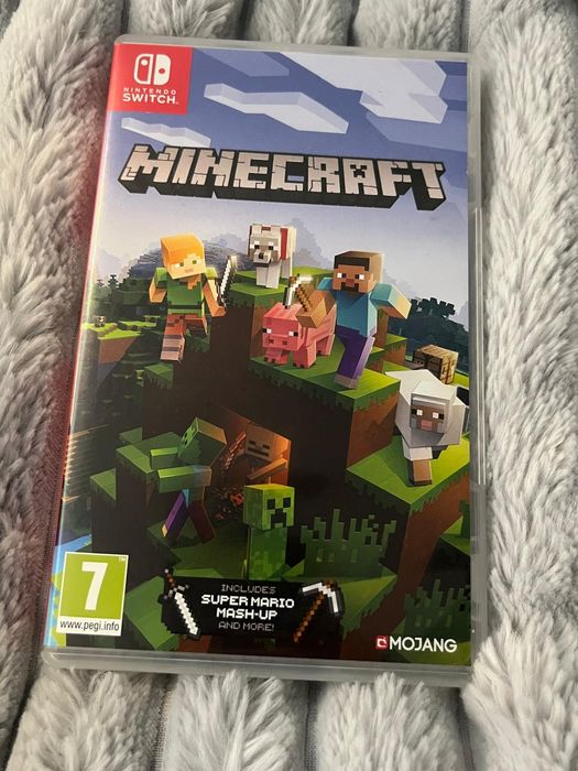 Nintendo switch in cutie cu doua jocuri minecraft