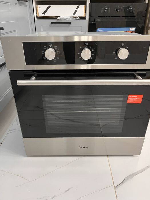 Продам встраиваемую духовку Midea