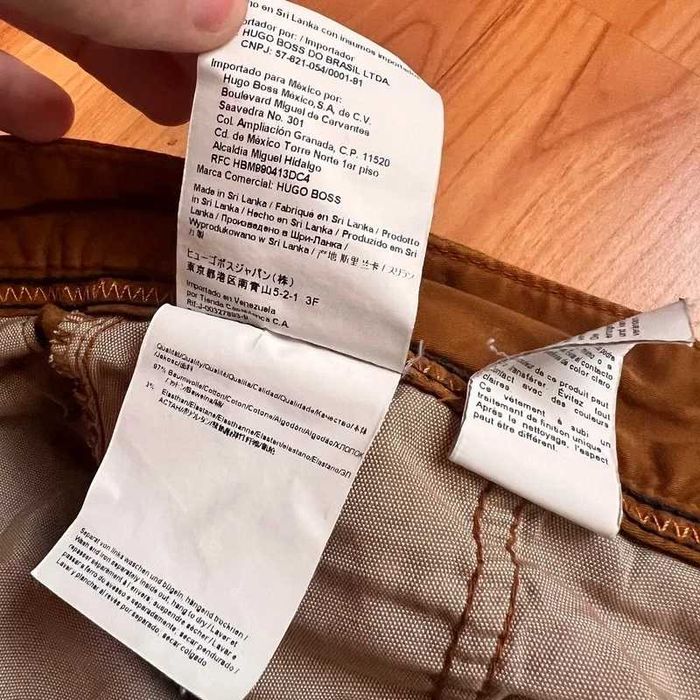 Pantaloni Hugo Boss chino croiala tapered fit maro