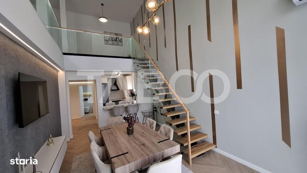 Penthouse lux ultrafinisat dotat si mobilat 2 nivele 131 mp si terasa — fotografia 1