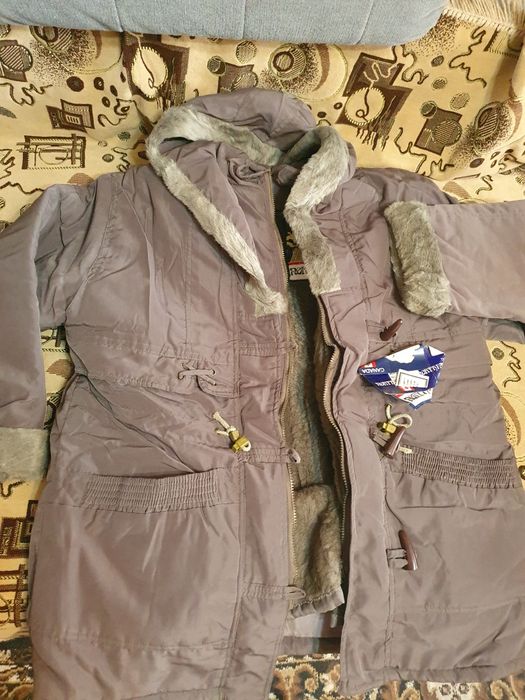 Продам куртку женскую