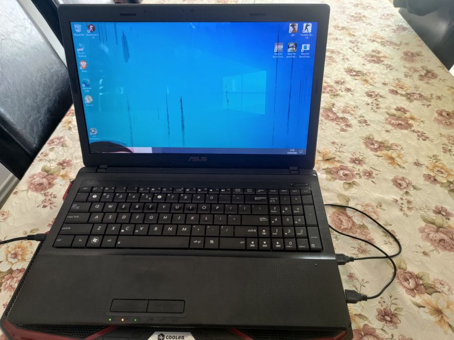 Laptop X54HR+ incarcator la pachet