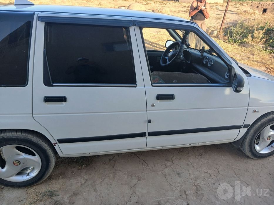 Tiko 2001 rangi oq