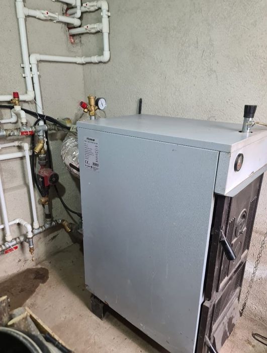 Vând centrală fontă 32kw