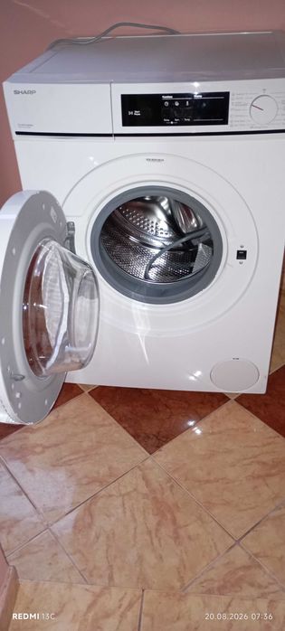 masina de spalat rufe SHARP este ca noua si muult sub pret