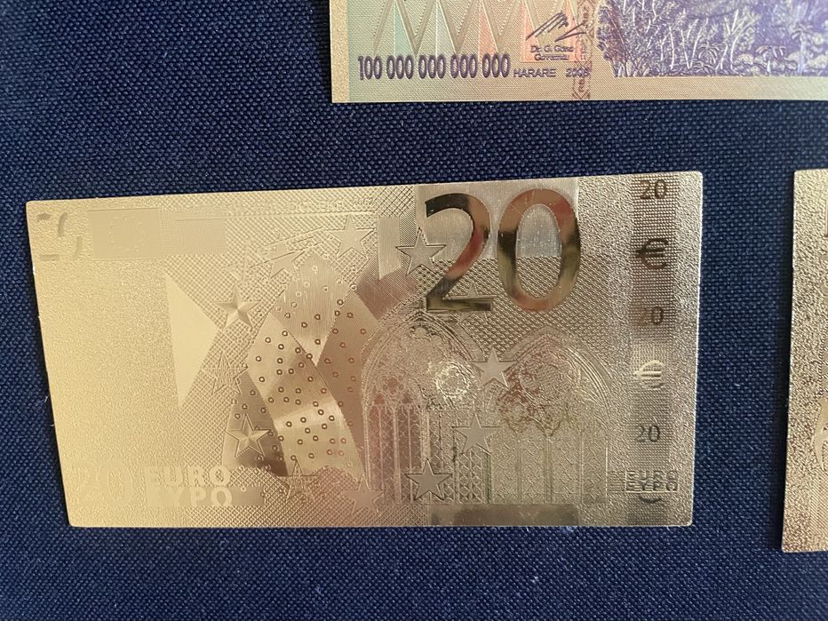 Bancnote 100 dolari aurite