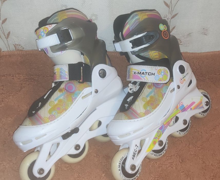 Роликовые коньки