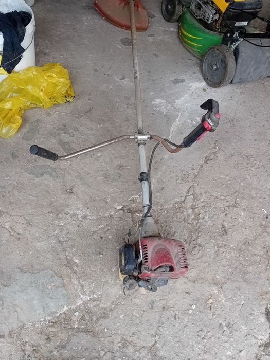 Coasa cu fir  kavasaki  in stare de functionare bună