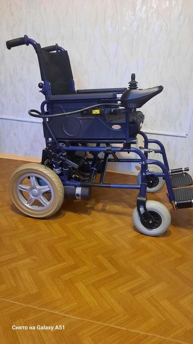автоматическая коляска для инвалидов