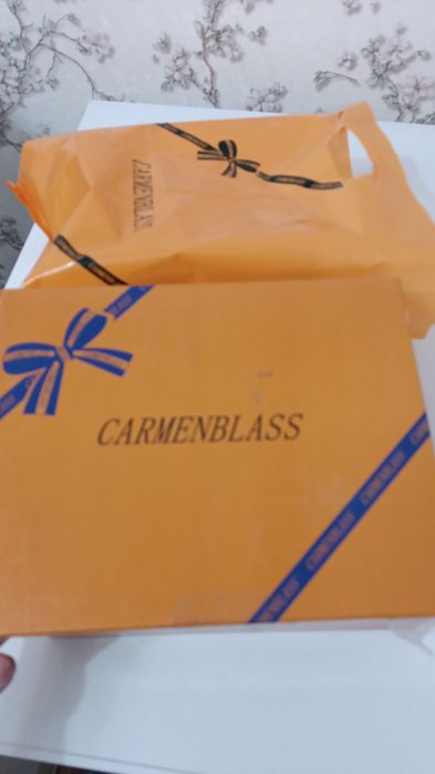 Продам новые сапоги