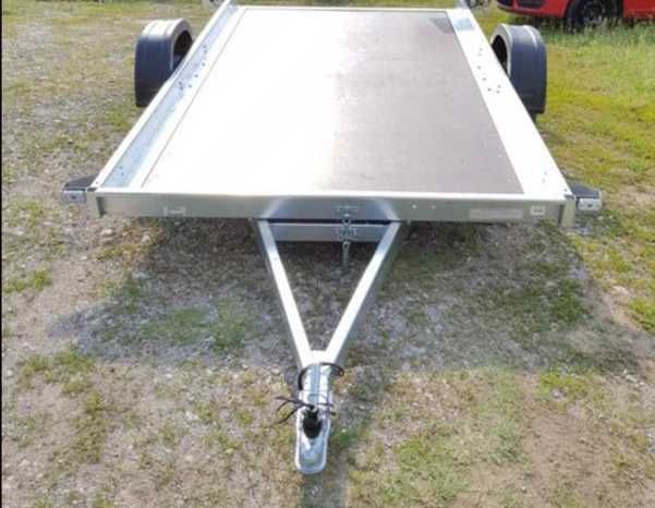 Ремарке,платформаремарке с повдигащ механизъм кат Б,750кг