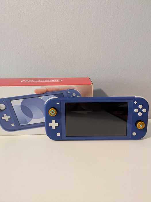 Nintendo switch lite ca nou + card Kingston 128gb