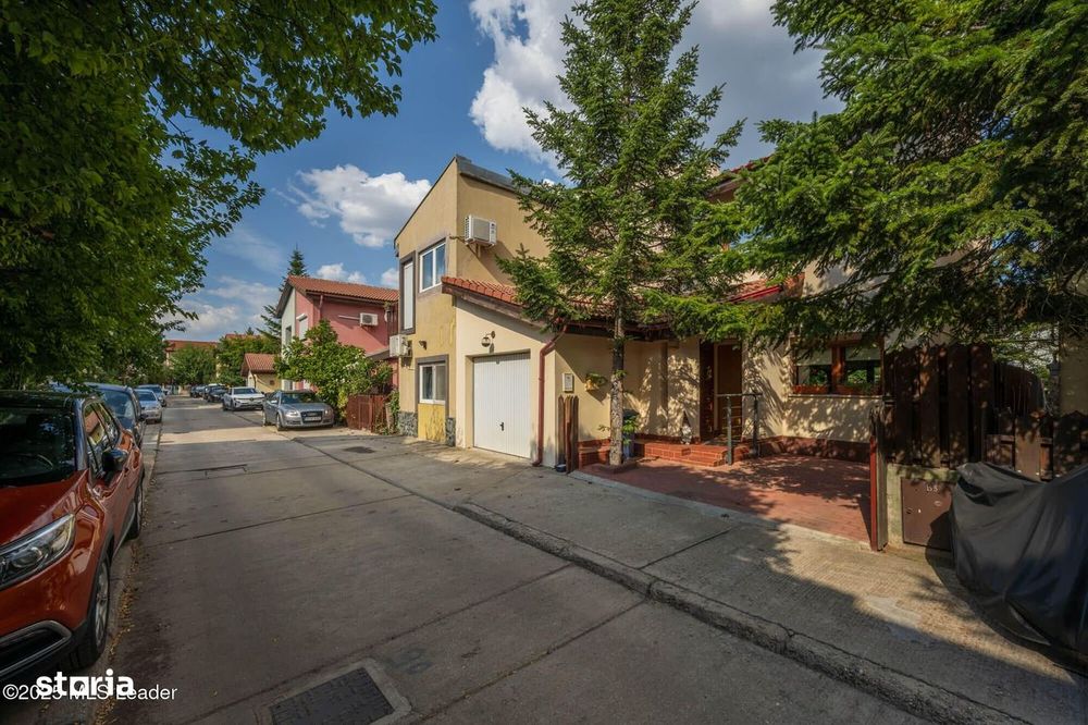 Casă eficientă, cu garaj, într-un complex liniștit, poziție excelenta