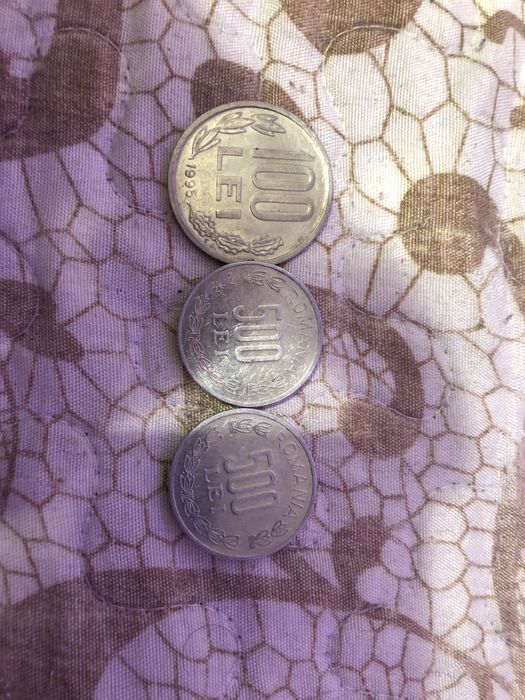 Moneda 100 de lei și 500