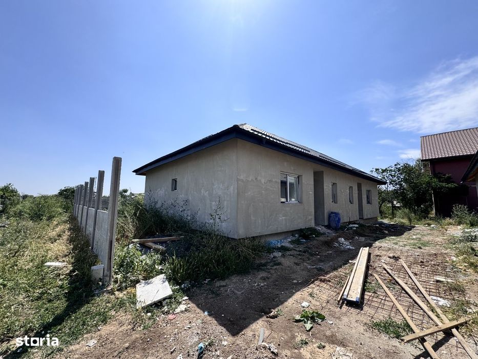Casa pe parter 3 cam+Pod.Teren 210mp.