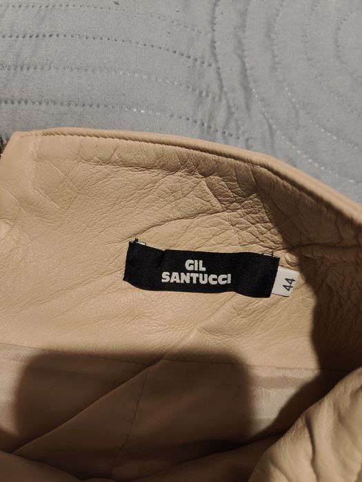 Пола Gil Santucci