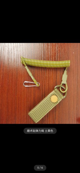 Universal pistolet g‘ilofi zamonaviy kabura purujinadi bilan.