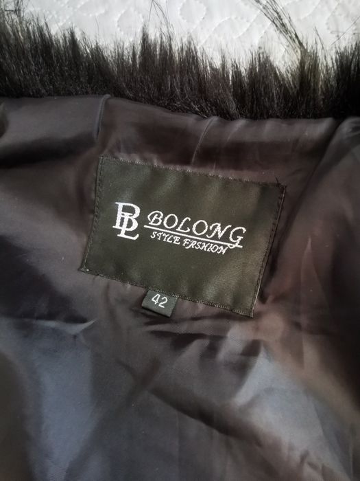 Кожен елек с пухкав косъм