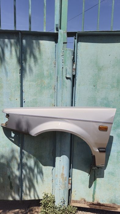 Крыло водительской стороны мазда 323